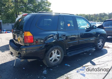 2003 GMC Envoy Sle z USA, uszkodzony, nr VIN 1GKDT13SX32343603